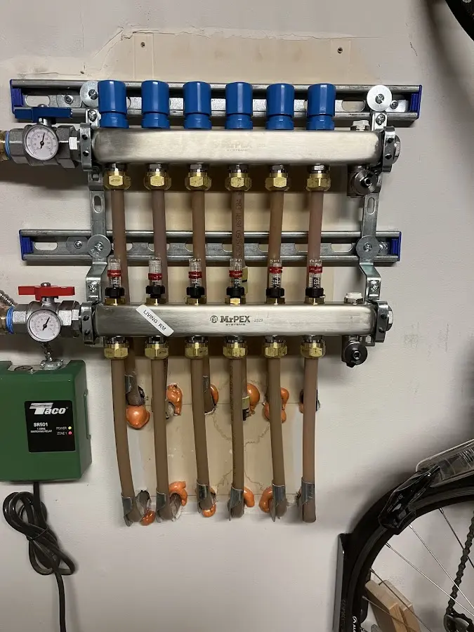 Plumber performing Water Heater Repair at a residential property in Green Oaks